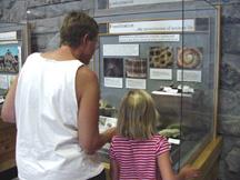 Summer and Diana looking at exhibit